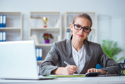 Solopreneur woman happy after getting services for bookkeeping for solopreneurs